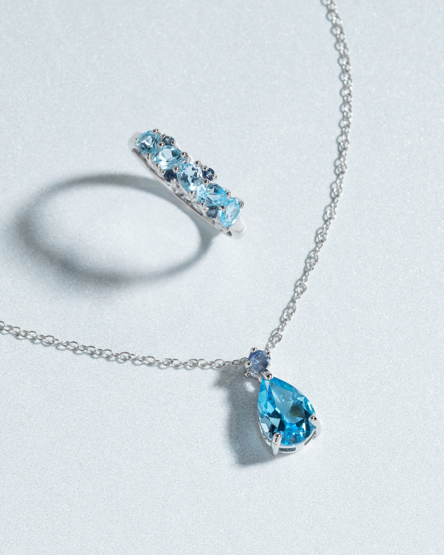Blue Sapphire & Blue Topaz Pear Cut Half Eternity Band in Sterling Silver