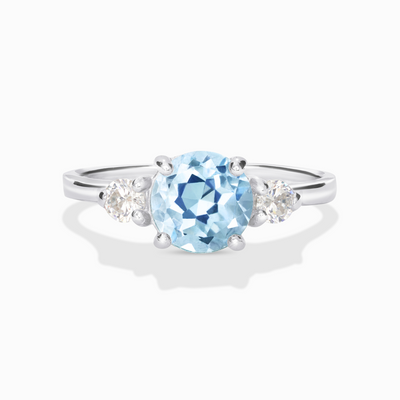 Blue Topaz Three Stone Ring in Sterling Silver